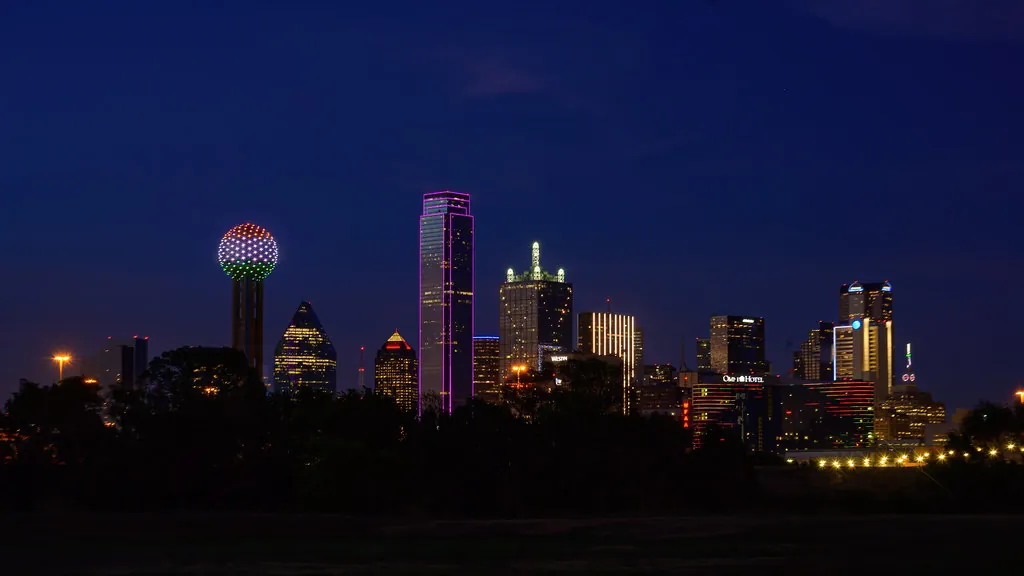 Dallas skyline at dusk with Reunion Tower lit