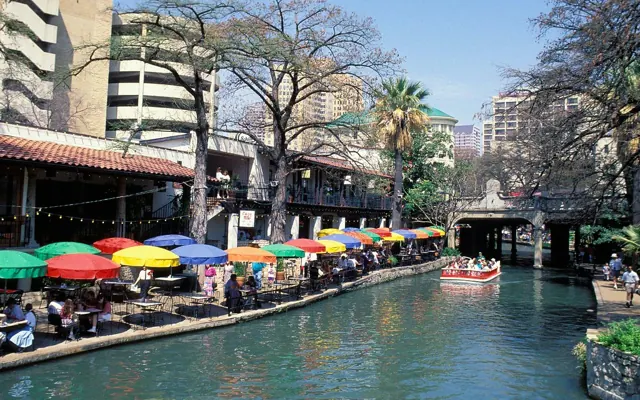San Antonio River Walk with colorful umbrellas